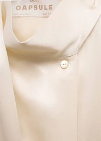 Cape-style silk dress with bow neck