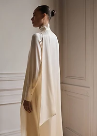 Cape-style silk dress with bow neck