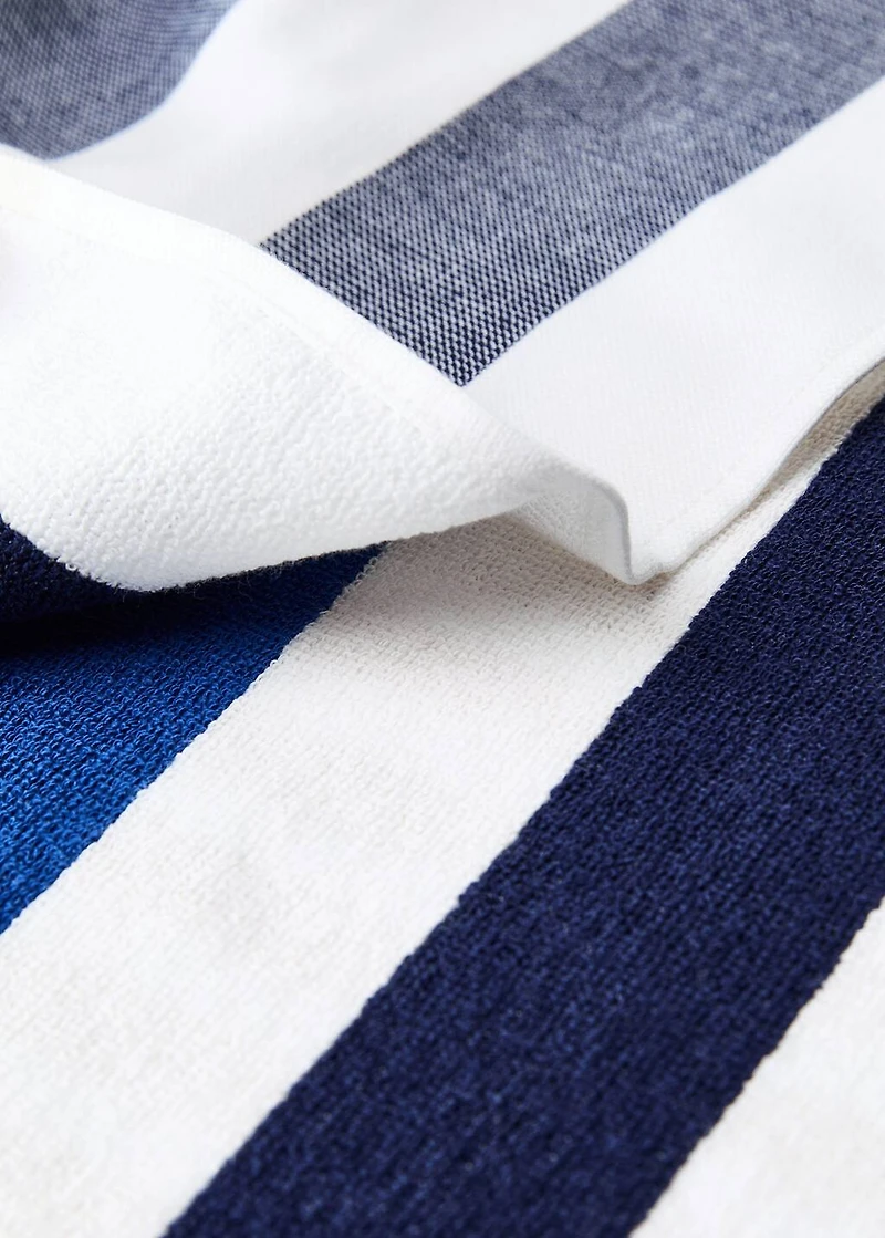 Beach towel with multi-colored stripes and fringes