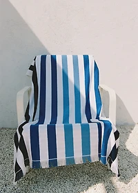 Beach towel with multi-colored stripes and fringes
