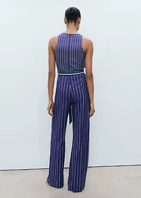 Striped jumpsuit with belt