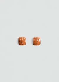 Earrings with relief design
