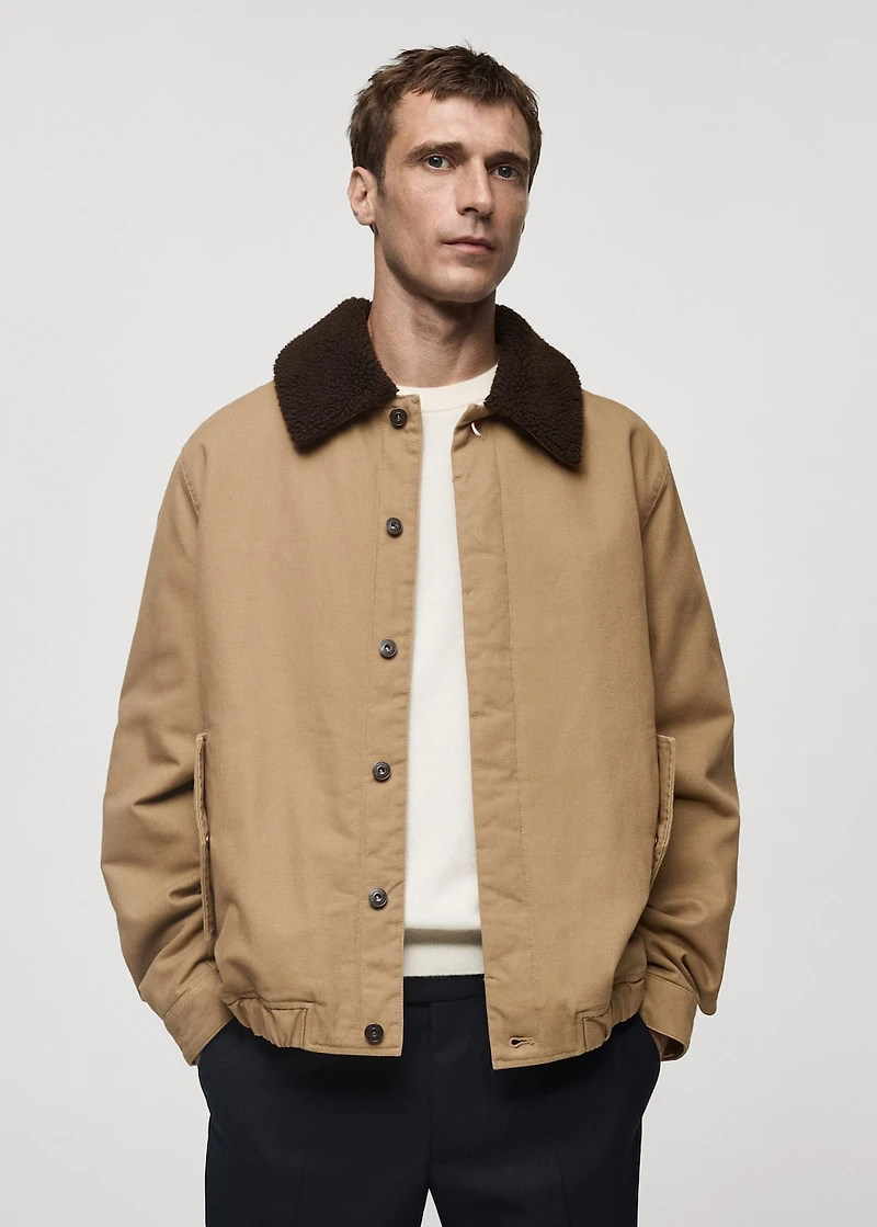 Quilted jacket with sheepskin collar