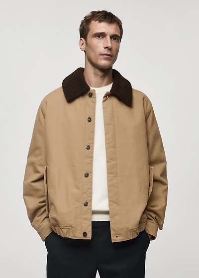 Quilted jacket with sheepskin collar