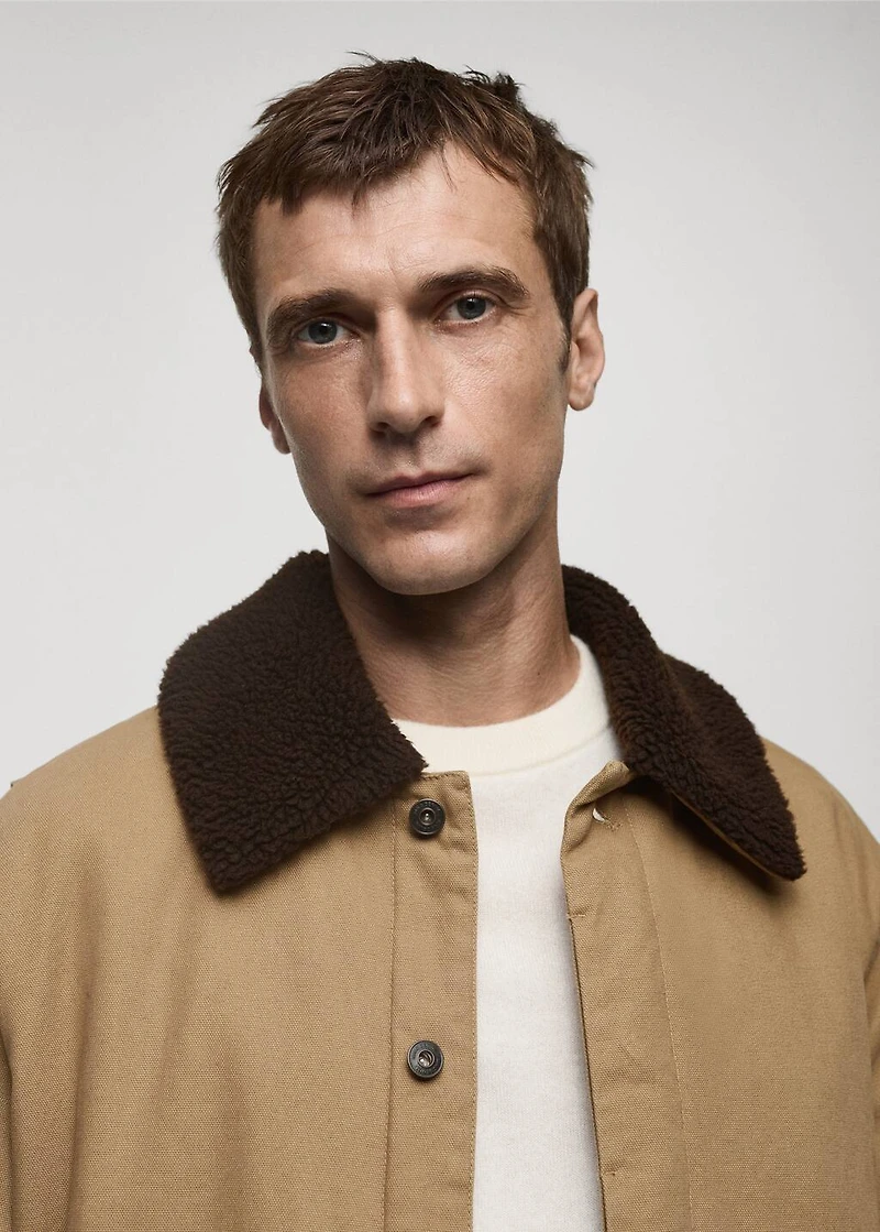 Quilted jacket with sheepskin collar