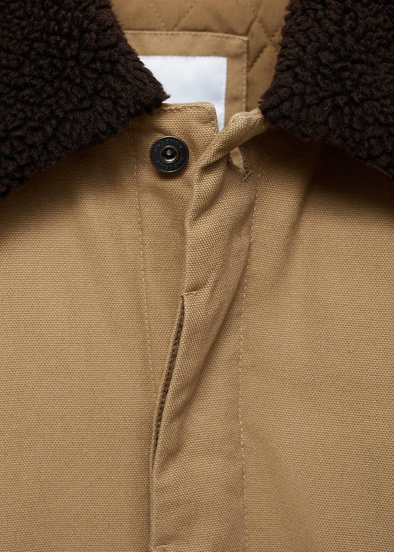 Quilted jacket with sheepskin collar