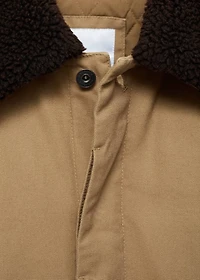 Quilted jacket with sheepskin collar