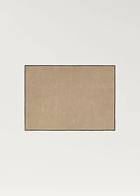 Linen placemat with ribbed detail