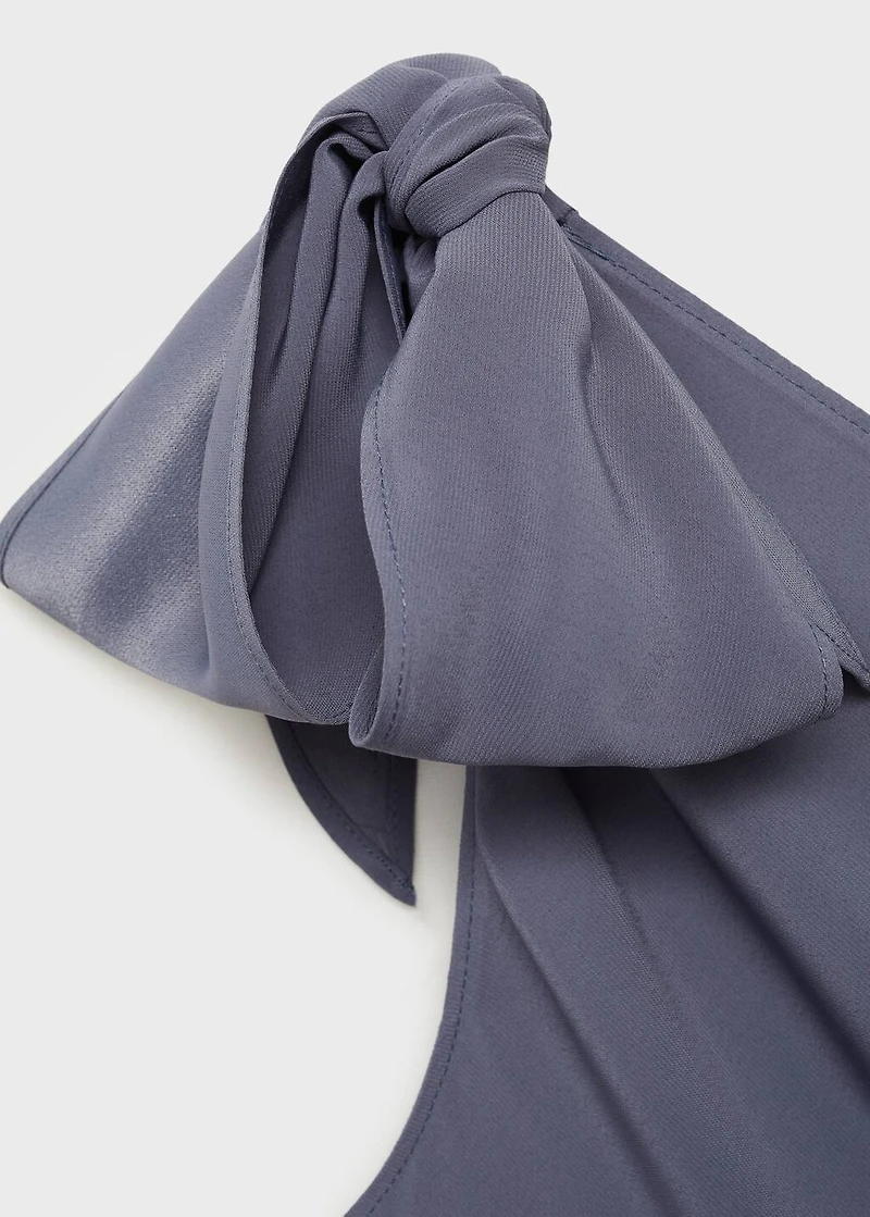 Asymmetrical satin jumpsuit with bow