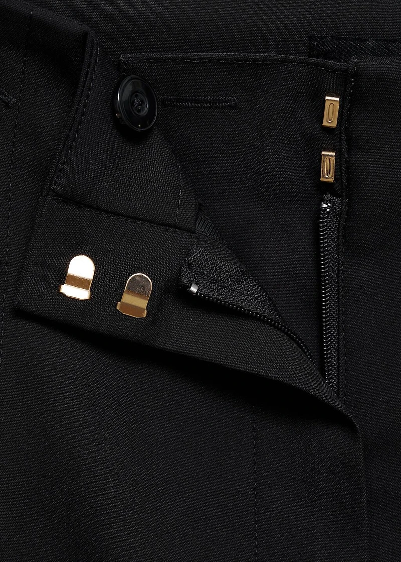 Straight pants with jewel buttons