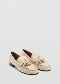 Leather moccasins with tassels