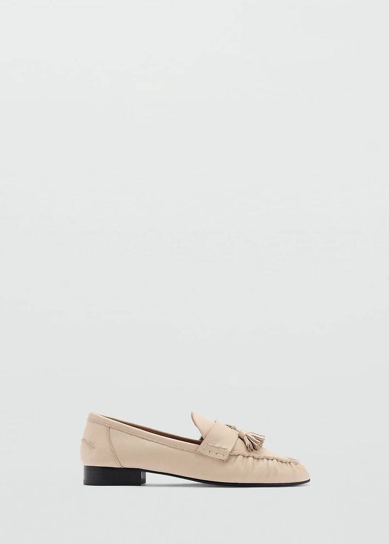 Leather moccasins with tassels