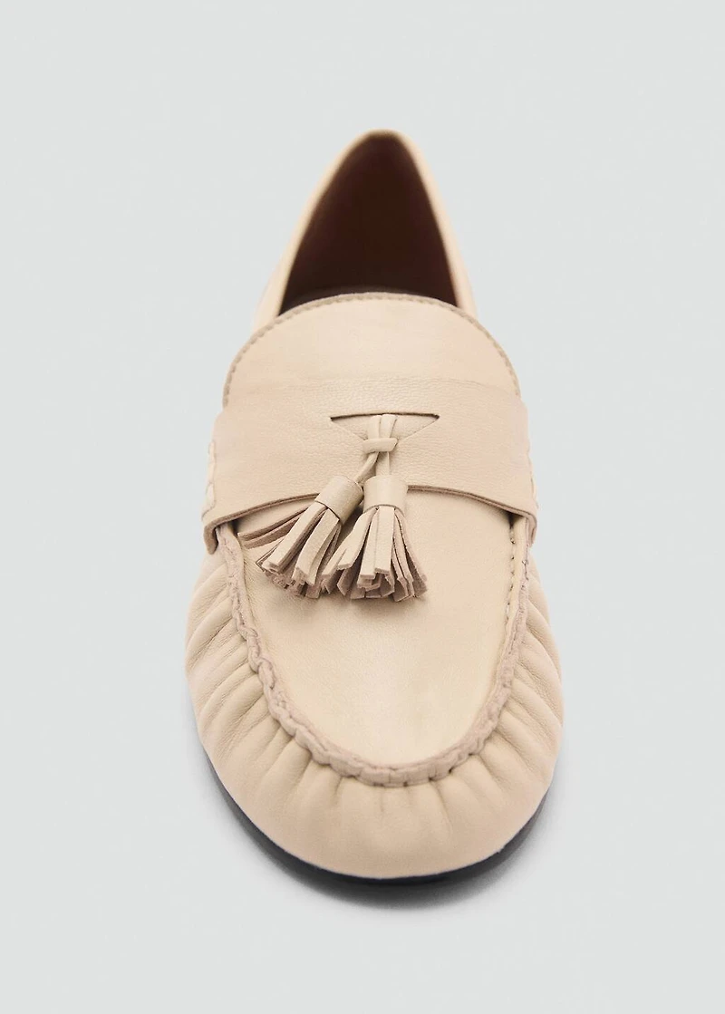 Leather moccasins with tassels