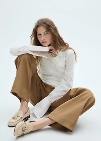 Leather moccasins with tassels