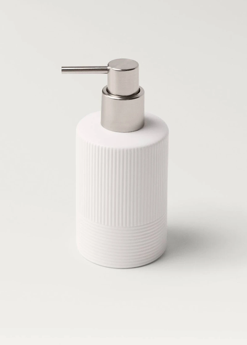 Stoneware soap dispenser with relief