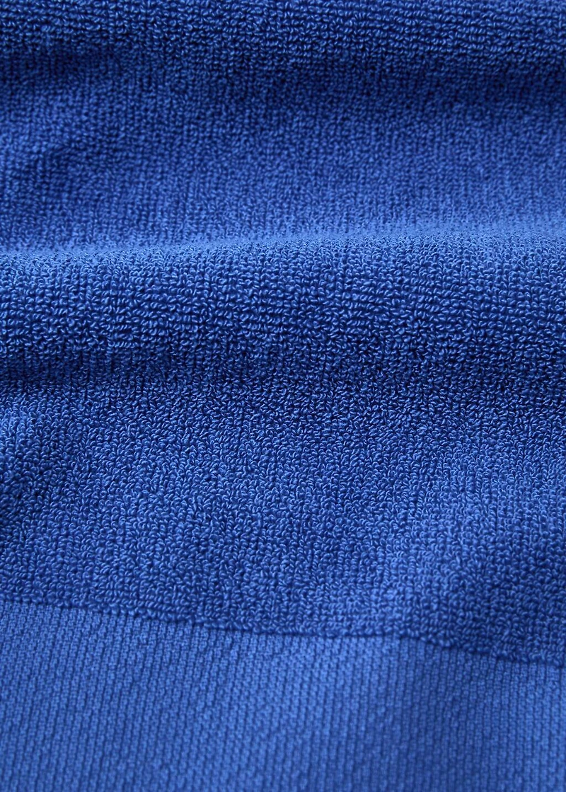 Overdyed terry beach towel with fringes