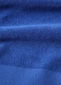 Overdyed terry beach towel with fringes
