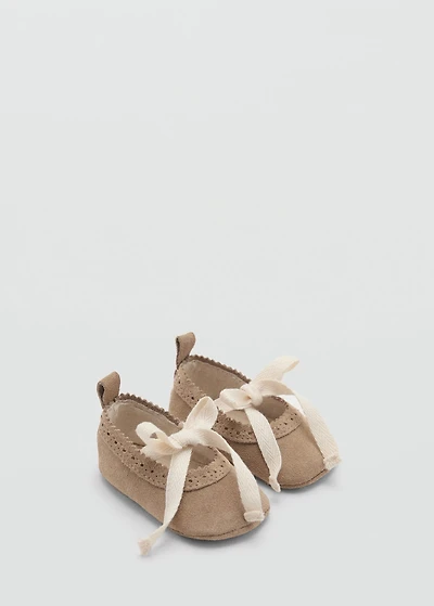 Ballet flats with leather bow