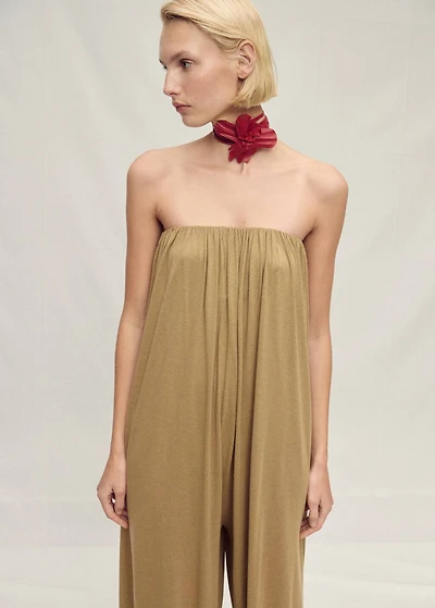 Strapless jumpsuit with puffed hem