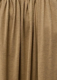 Strapless jumpsuit with puffed hem