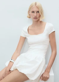 Combined dress with puffed hem