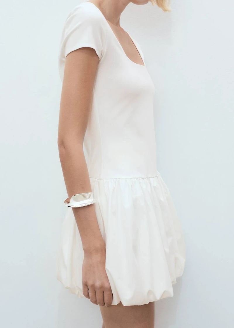 Combined dress with puffed hem