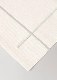 Cotton embroidered placemat with scalloped detail