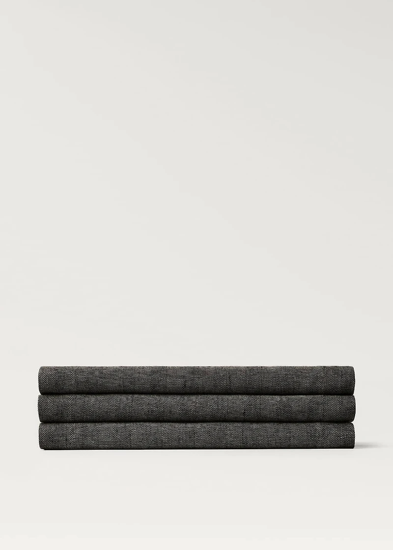 Linen table runner with herringbone structure