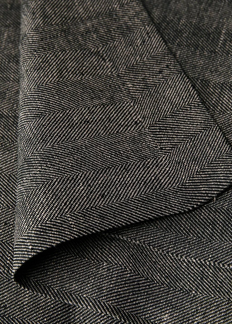 Linen table runner with herringbone structure