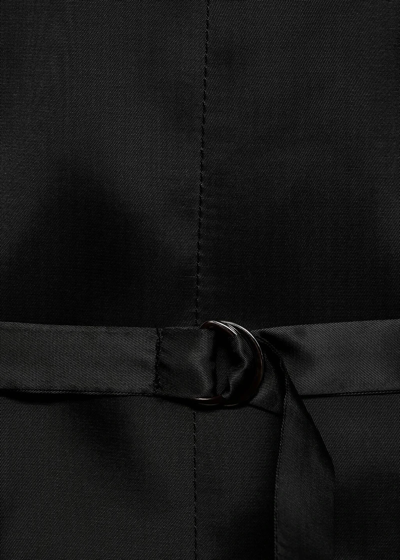 Vest with adjustable belt