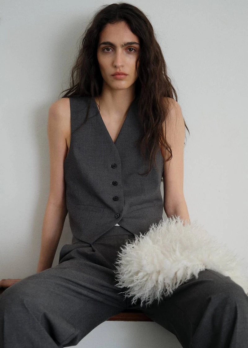 Vest with adjustable belt