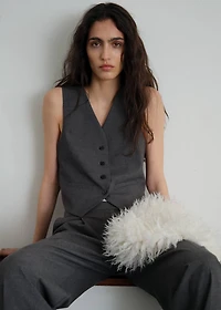Vest with adjustable belt