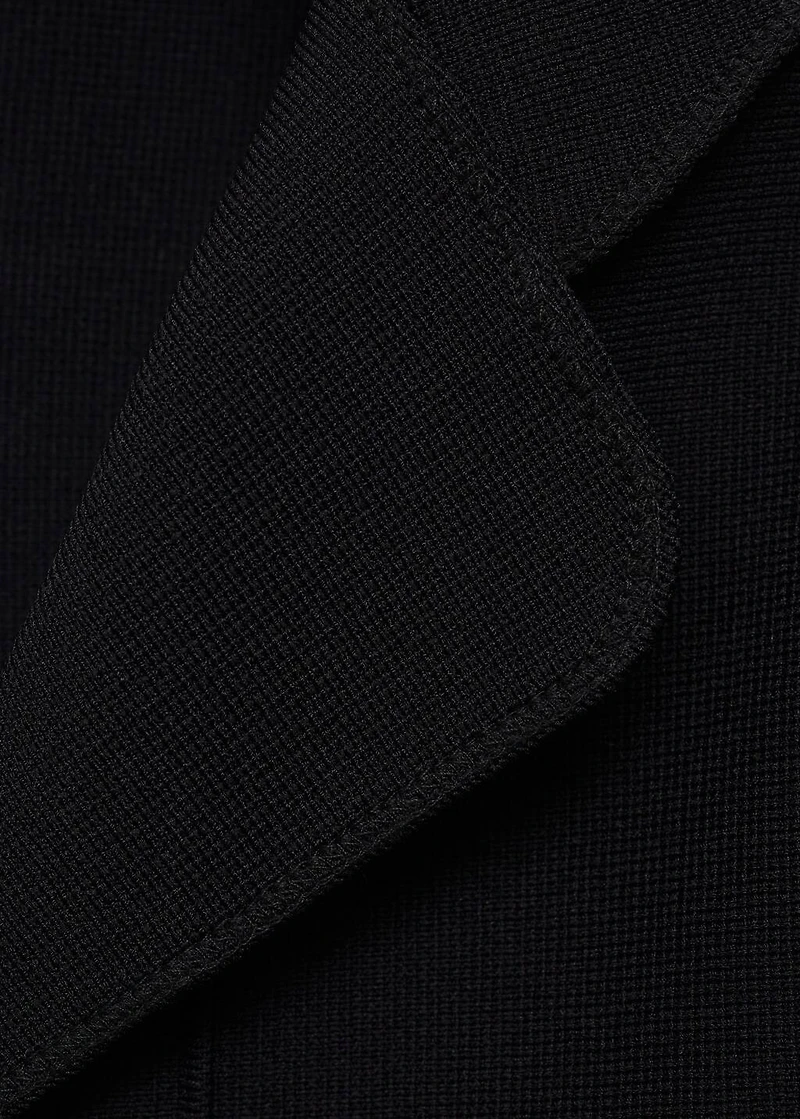 Knitted jacket with lapel collar