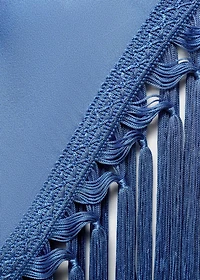 Asymmetrical satin dress with fringes