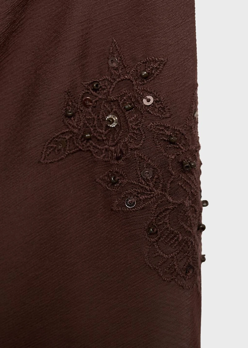 Embroidered mini-skirt with fringe