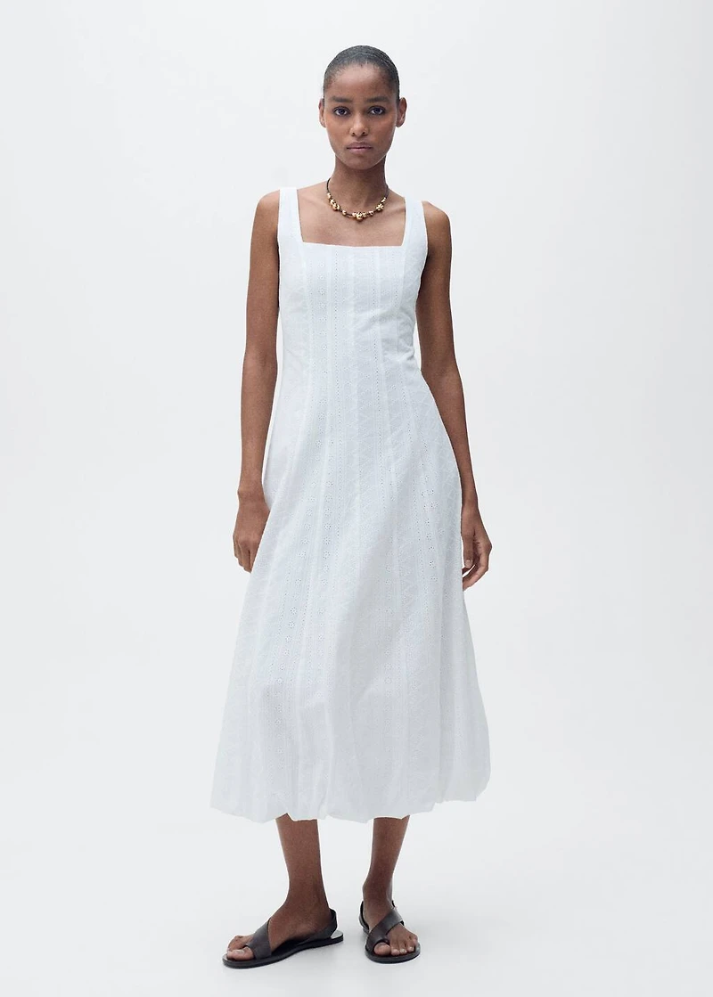Embroidered dress with puffed hem