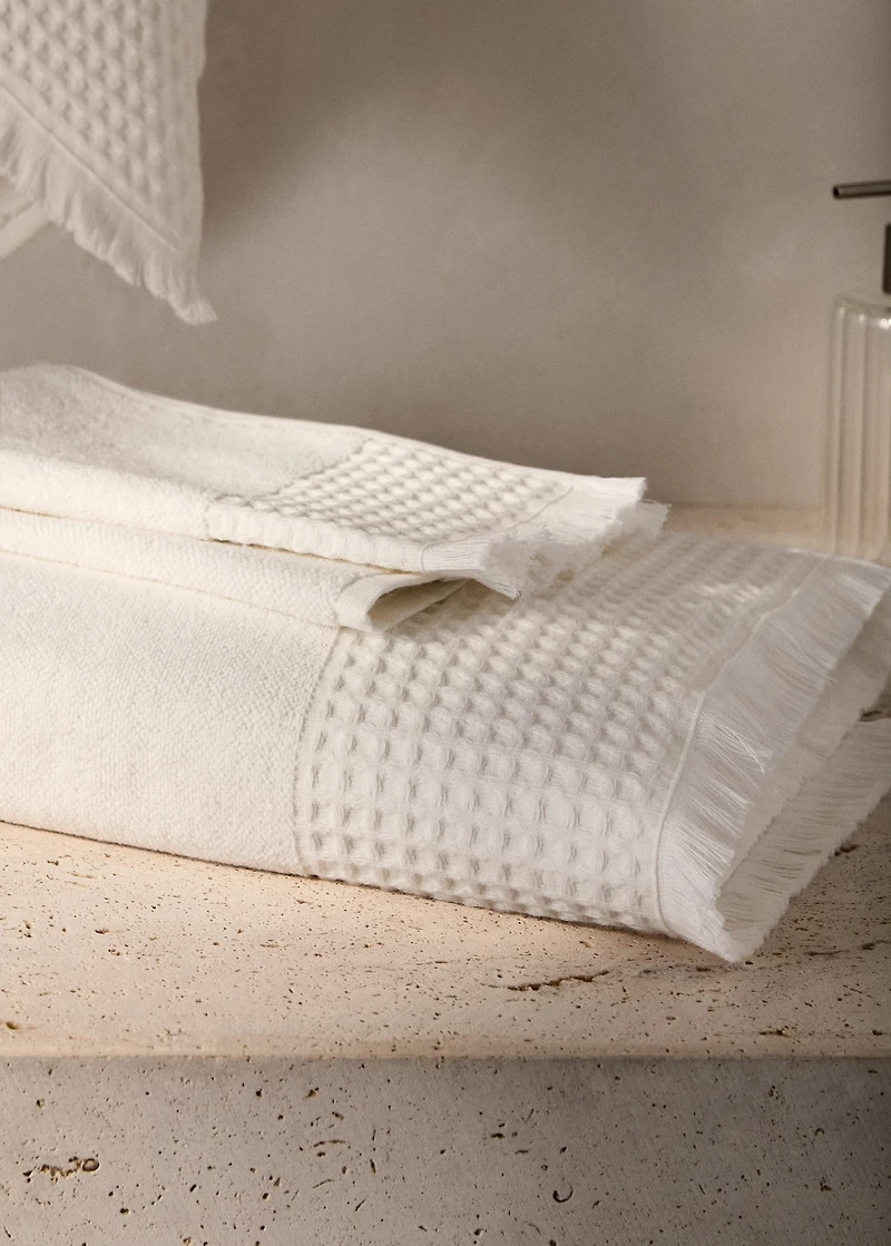 Bath towel with waffle trim and fringe