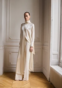 Cape-style silk dress with bow neck