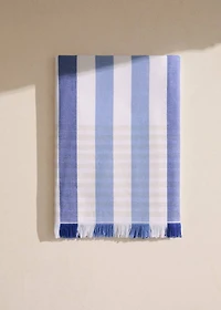 Beach towel with multi-colored stripes and fringes