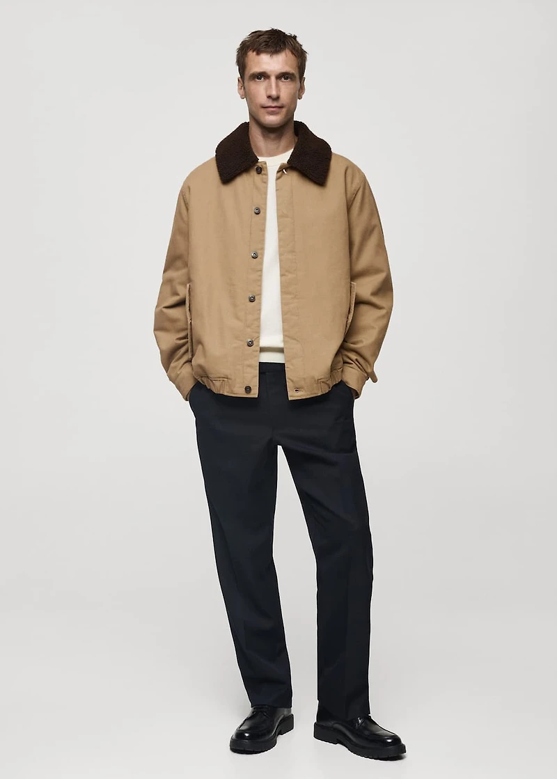 Quilted jacket with sheepskin collar