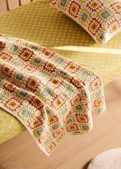 Children's multi-colored crochet blanket