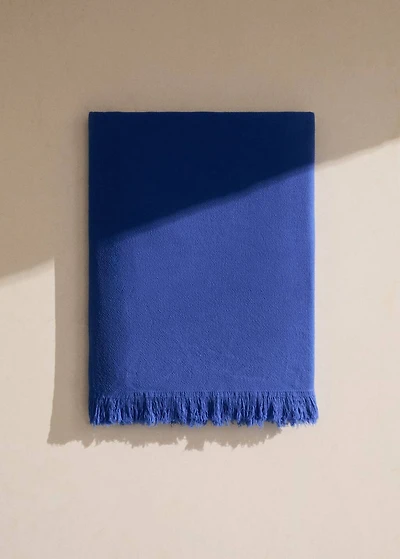 Overdyed terry beach towel with fringes