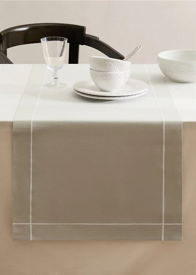 Cotton embroidered table runner with scalloped detail