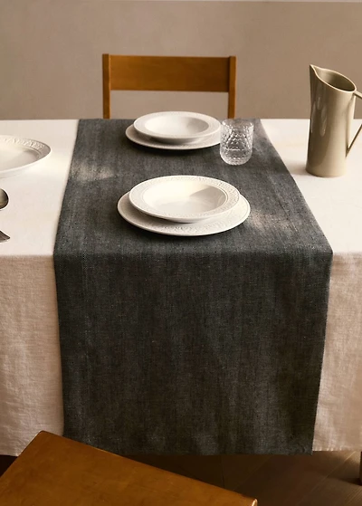 Linen table runner with herringbone structure