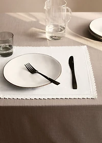 Linen placemat finished with lace
