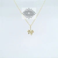 10k Yellow Gold Cubic Zirconia Bow Pave Pendant 155636