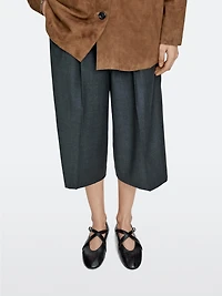 Ballet flats with criss-cross straps and buckle