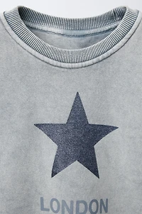 SWEAT EFFET DÉLAVÉ ÉTOILE BRILLANT