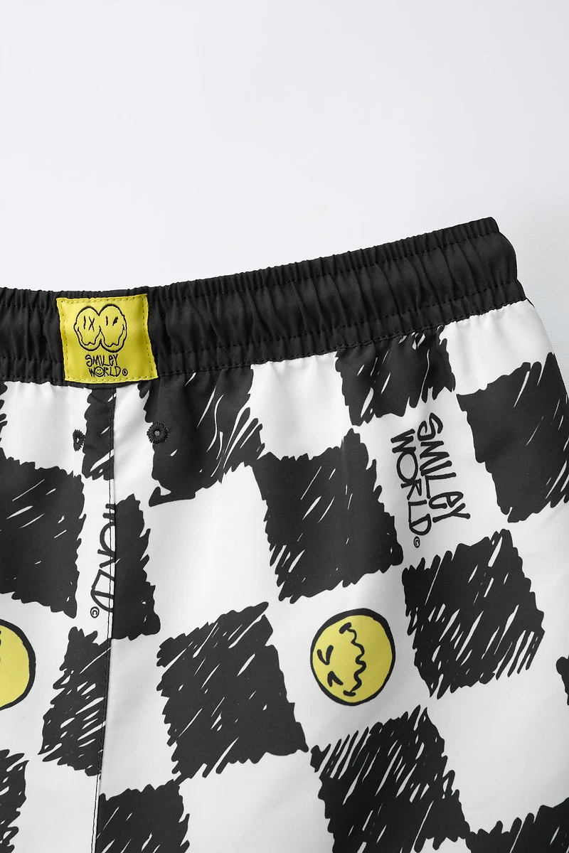 6-14 YEARS/ CHECKERBOARD SMILEYWORLD ® SWIM SHORTS