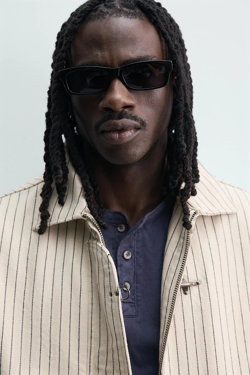 BLOUSON COURT RAYÉ À BRANDEBOURGS